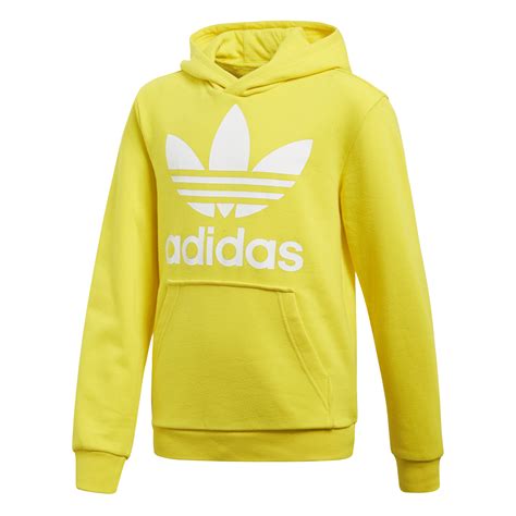 yellow adidas sweatshirt.